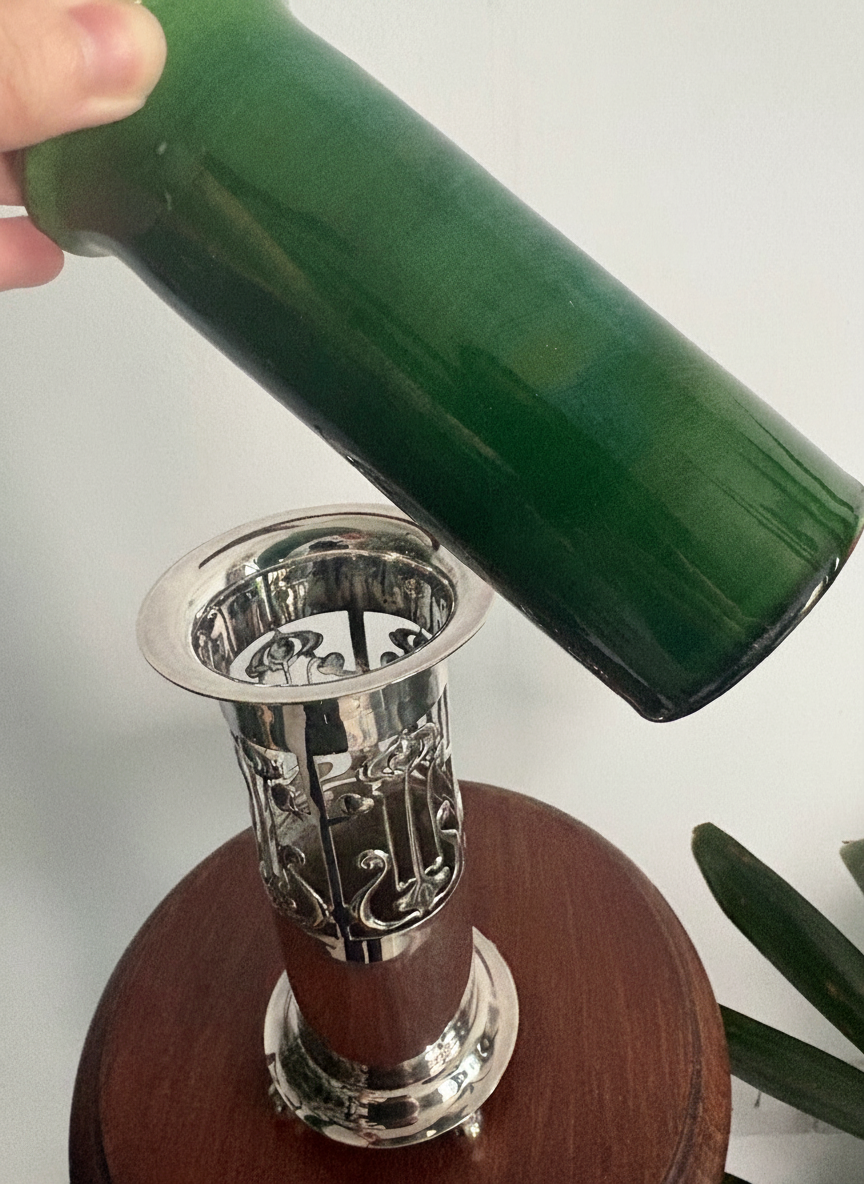 photo showing the green ceramic insert removed from the silver holder
