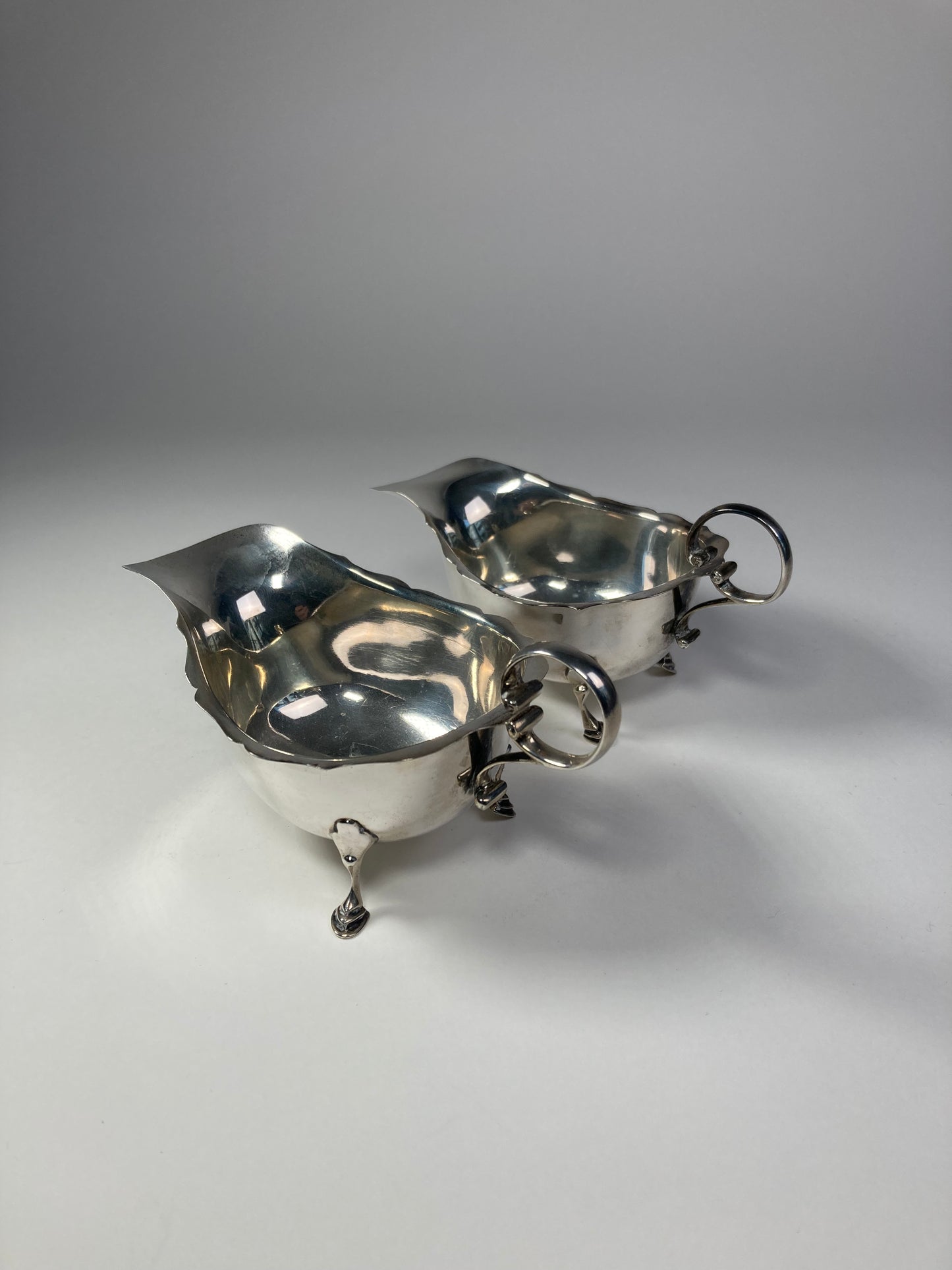 Asprey silver sauce boats back