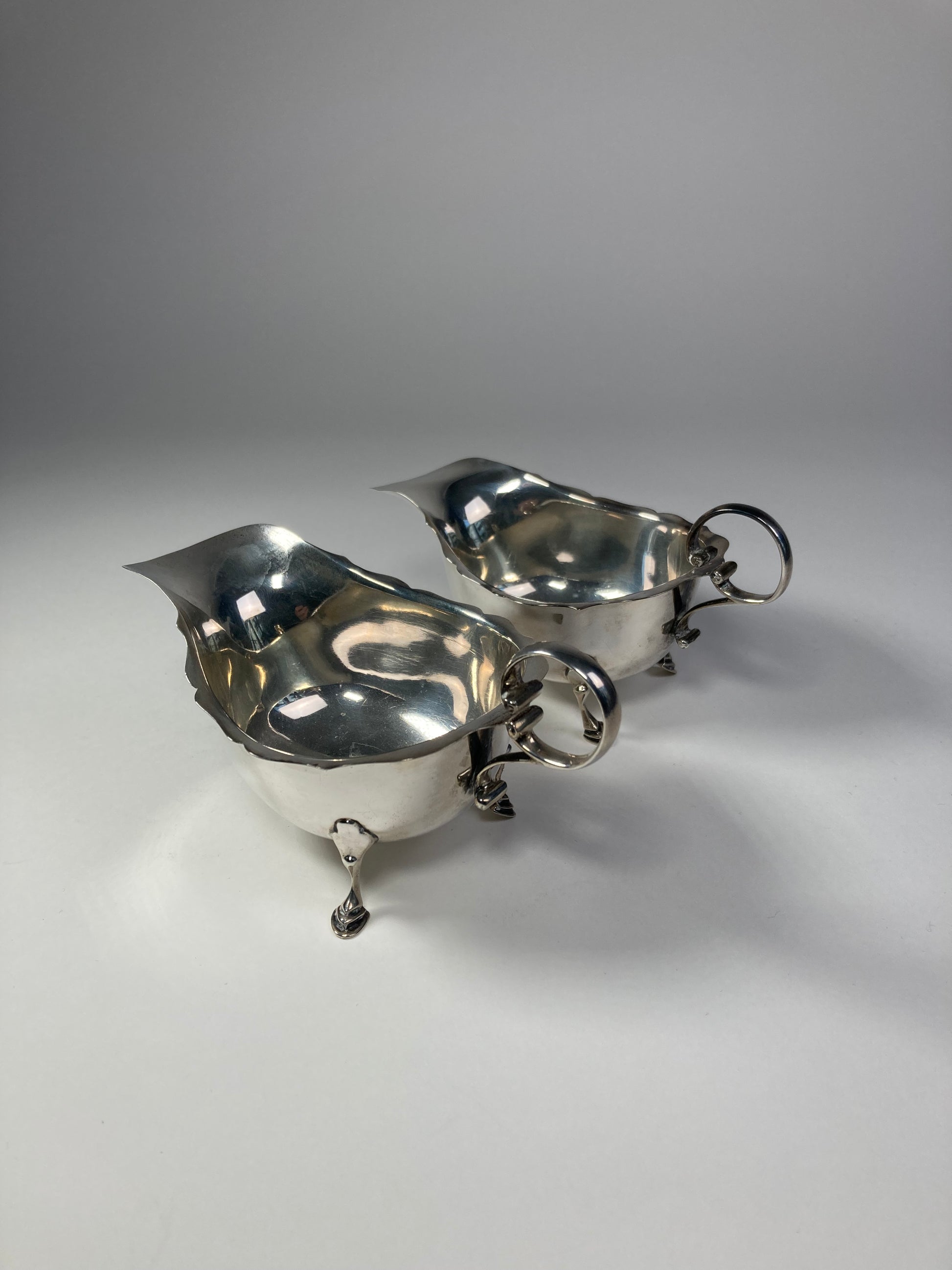 Asprey silver sauce boats back