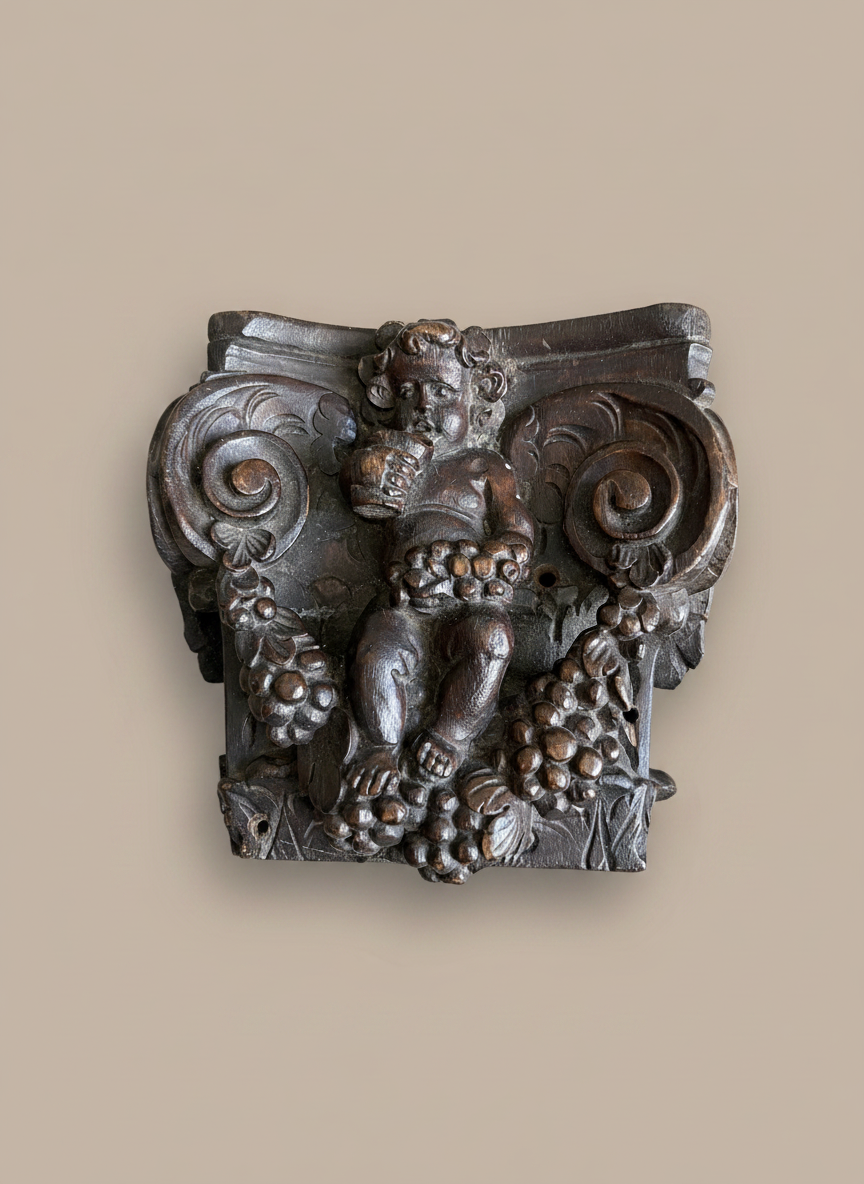 wood carving against a taupe wall